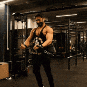 Man doing a cable chest fly lower position