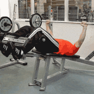 Man doing a decline barbell bench press
