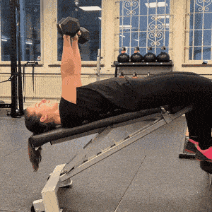 Man doing a dumbbell decline chest press