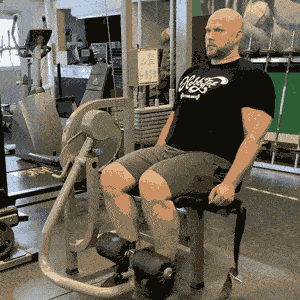 Man doing leg extensions