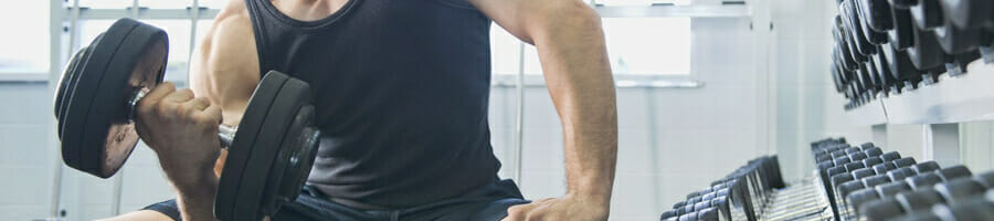man doing dumbells