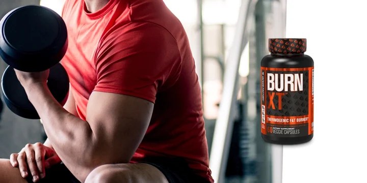 Lifting dumbbell with Burn XT Overlay