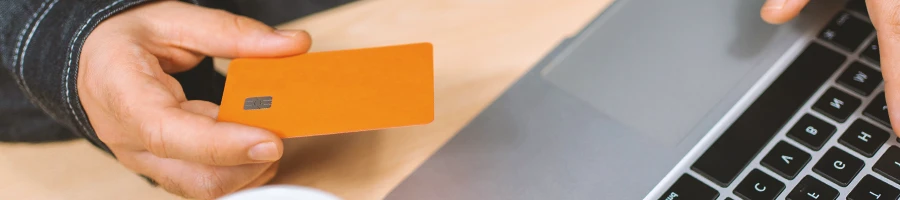 credit card and laptop