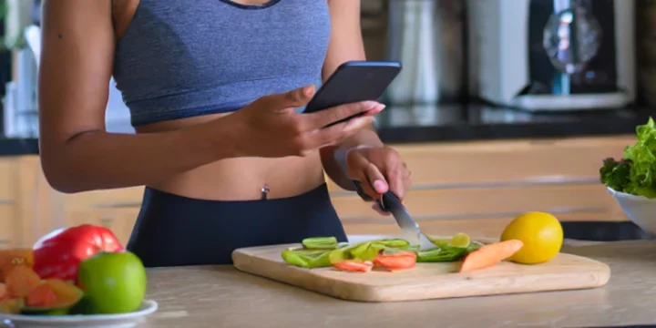 Fit Woman preparing a meal