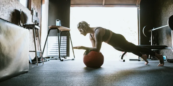Woman working out in garage