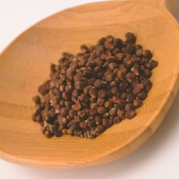 Grains of Paradise on a wodden plate