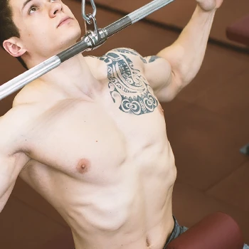 A man doing seated pulldowns