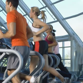 A group of people working out in the gym