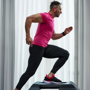A fit man doing stair climbing