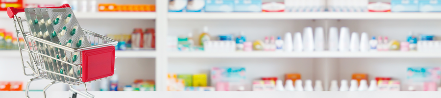 stack of vitamins in a shopping cart