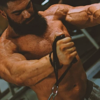 A man doing chest cable workout