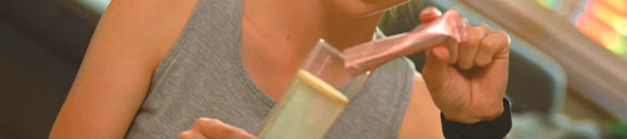 Woman preparing workout drink