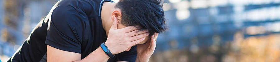 An athlete with a headache side effects