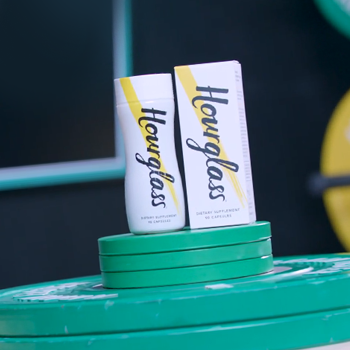 An hourglass fit product on top of a weight