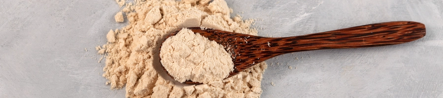 Scoop of protein powder from above